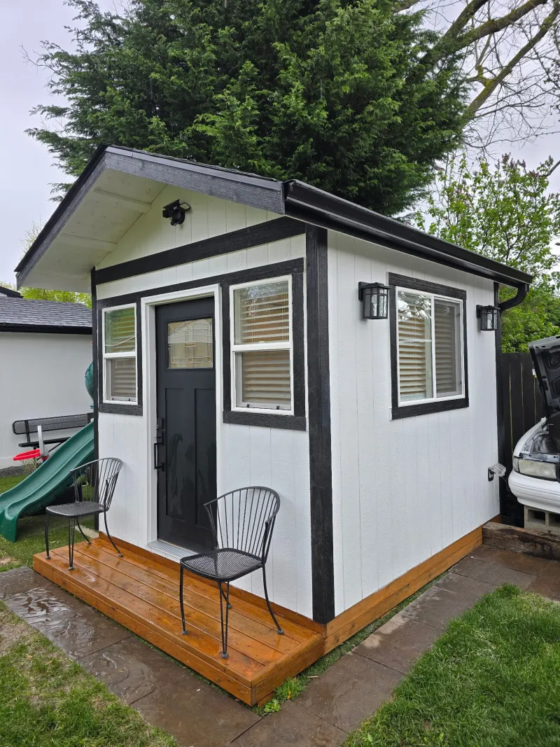 Custom she shed with windows and flower boxes