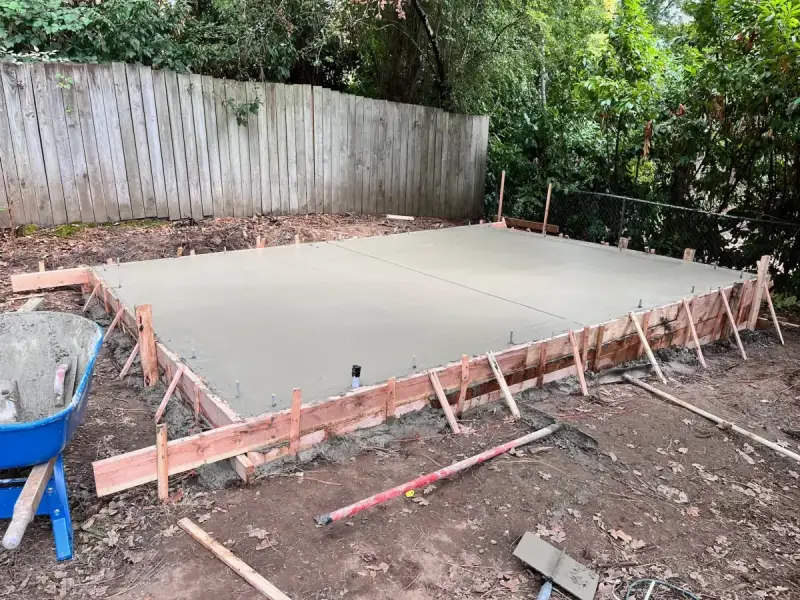 Pressure-Treated or Concrete Floors — Because They Will Get Wet